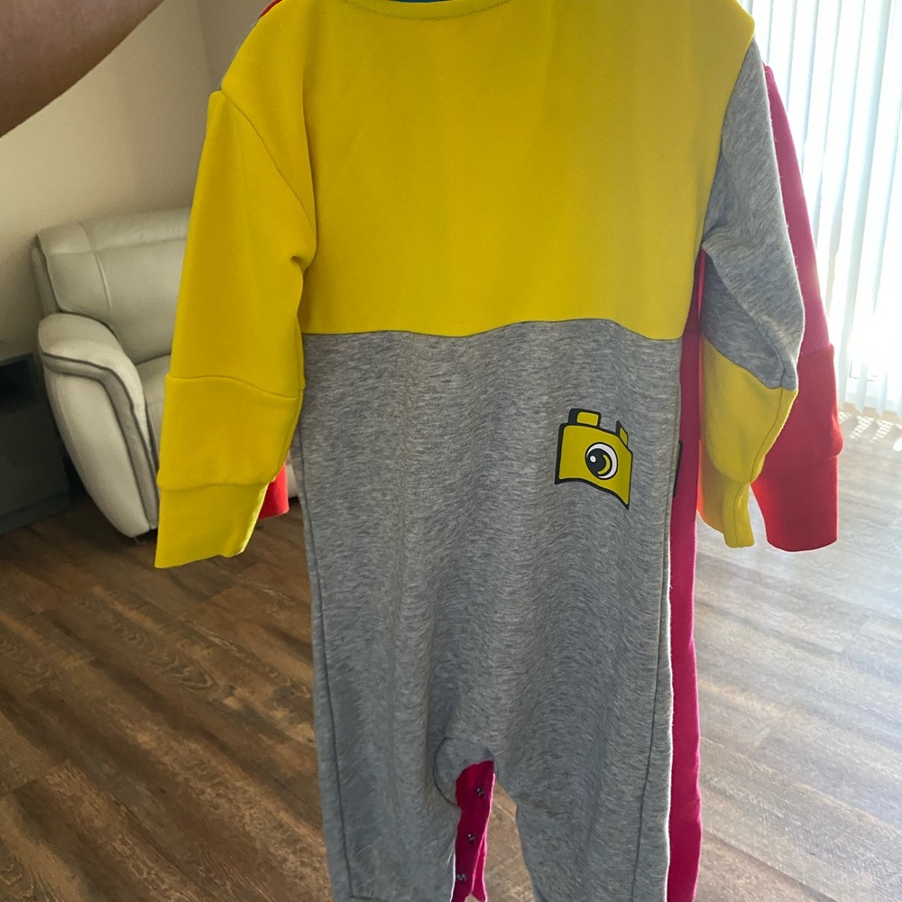 New Adidas one piece. Unisex. Both only worn once no stains